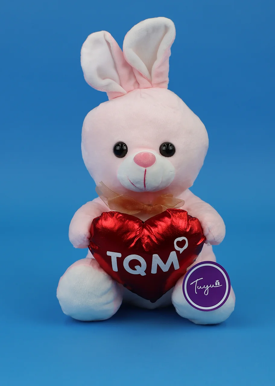 Tierna conejita rosa con corazón TQM de 26 cm. aproximadamente